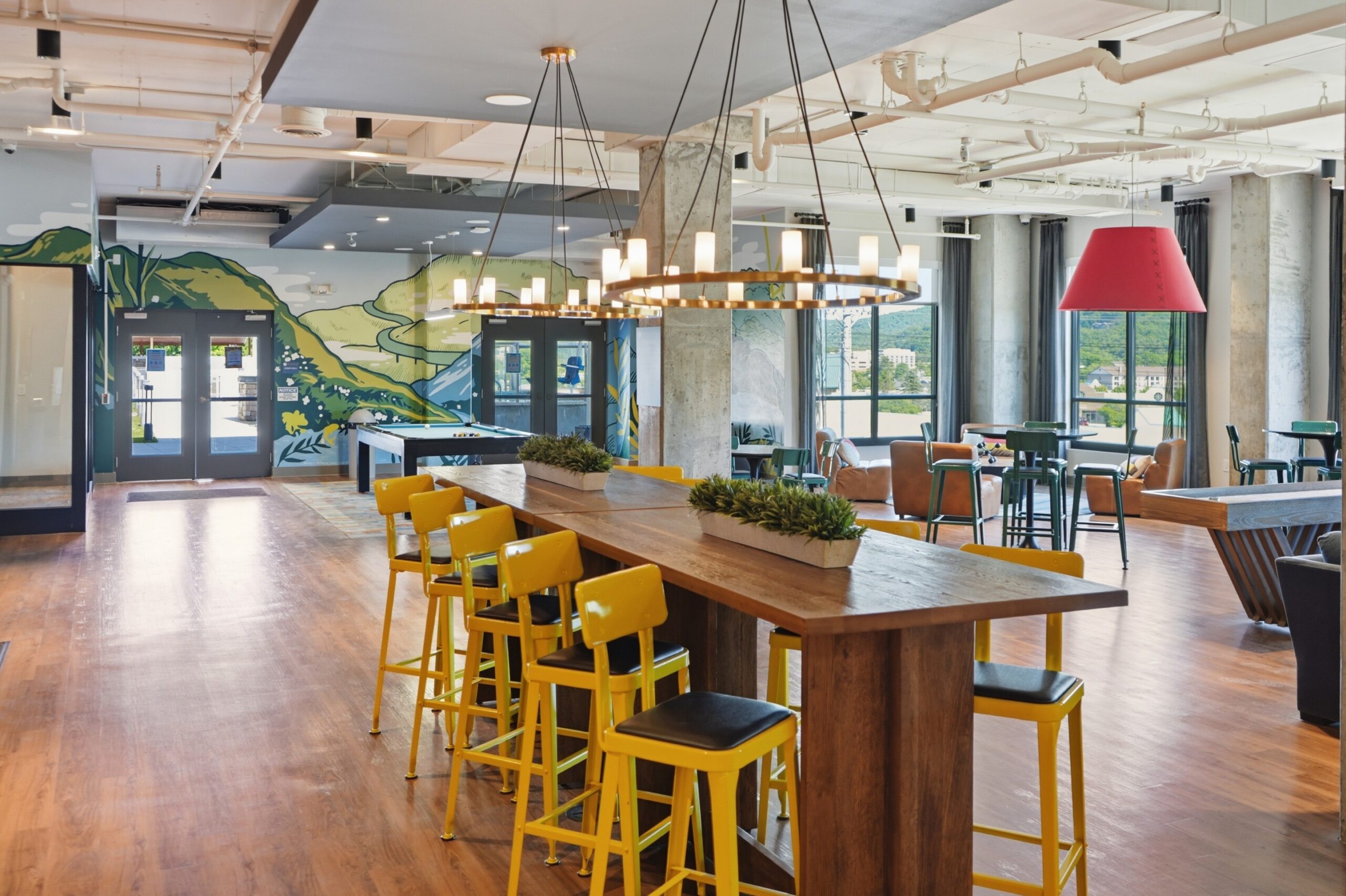 Clubhouse with shuffleboard and pool table scaled