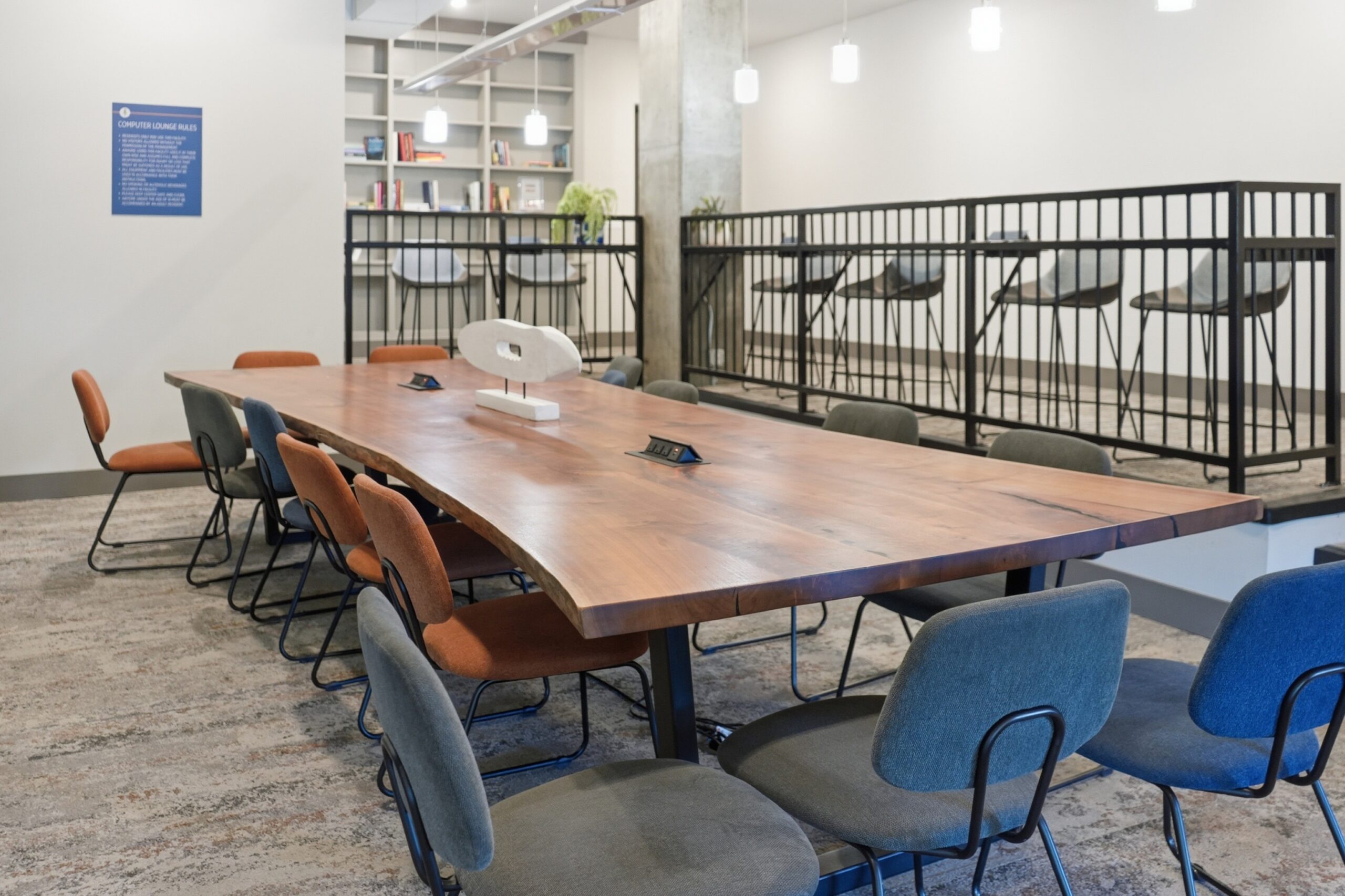 Large meeting table in a study room at The Finmore at 241 scaled