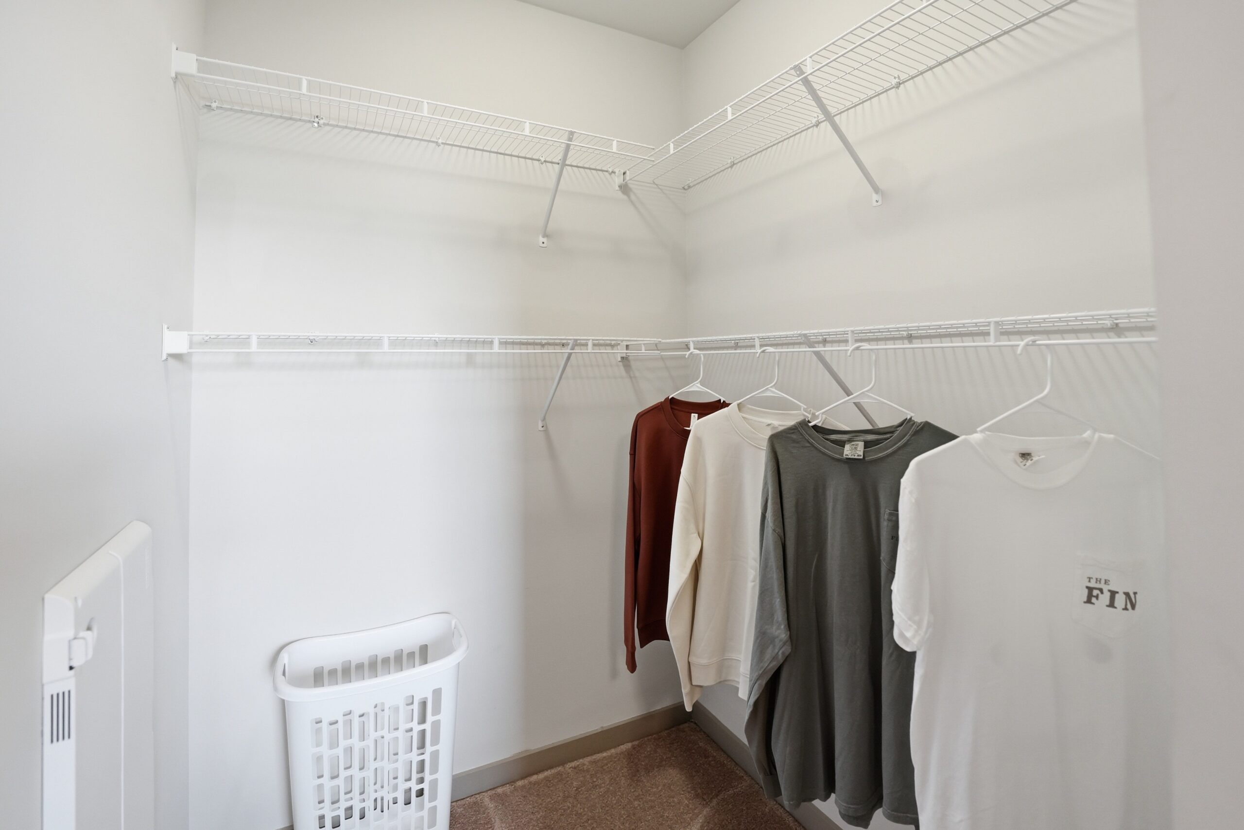 Oversized closet in a model student apartment at The Finmore at 241 scaled
